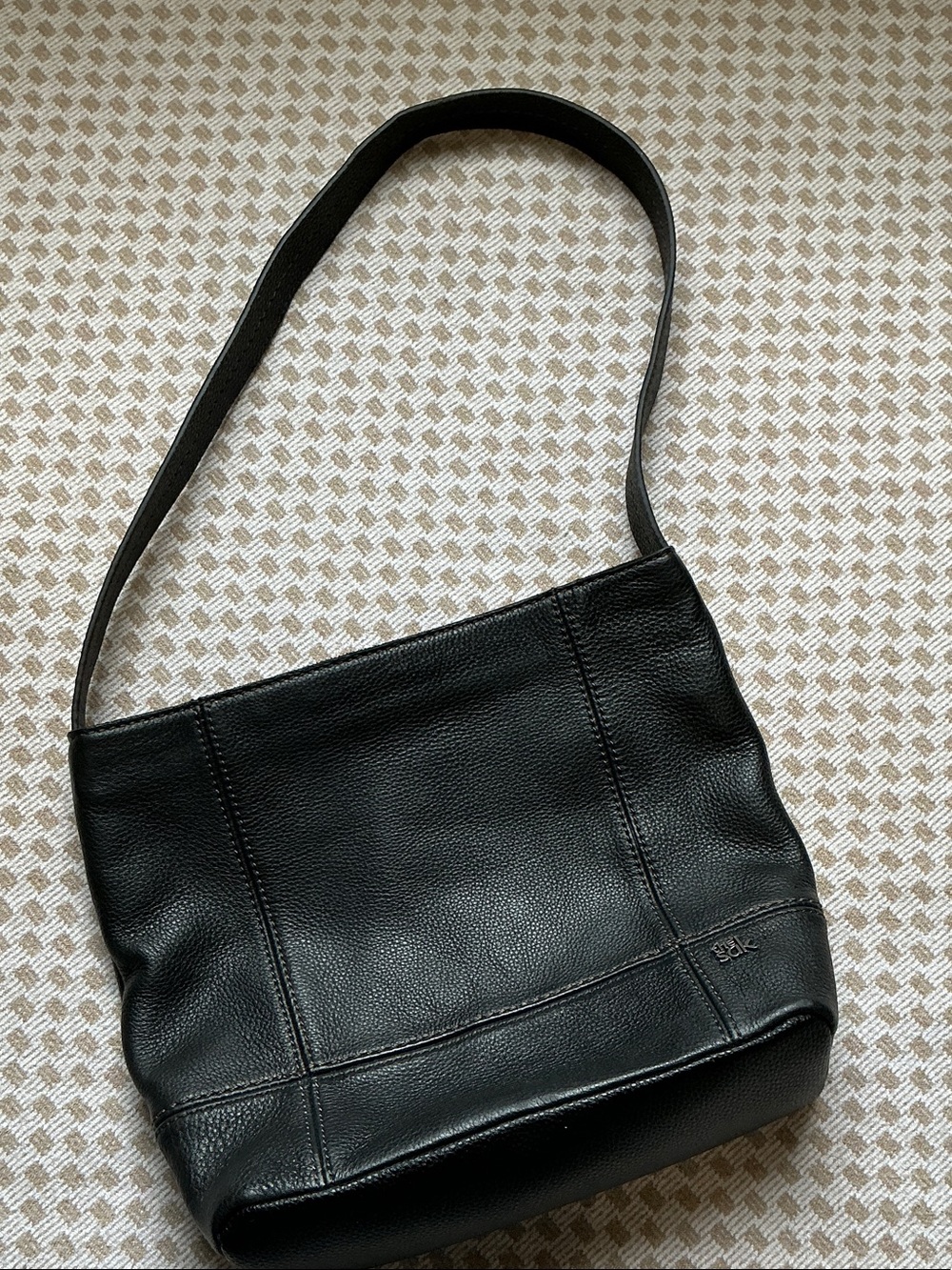 The Sak Black Pebbled Leather Messenger Bag